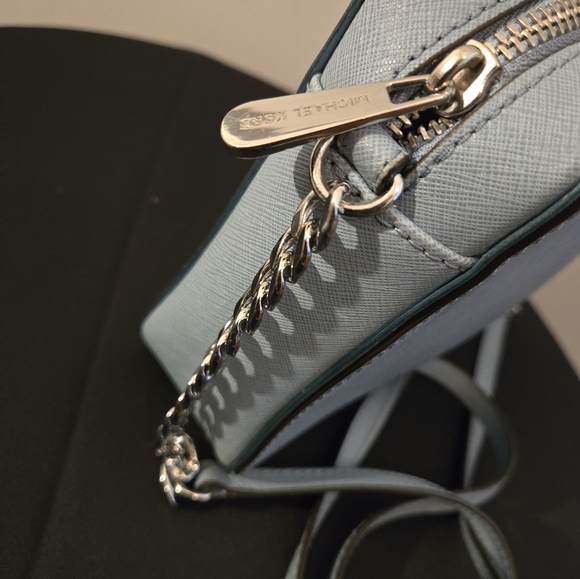 The Michael Kors Jet Set Travel Crossbody Bag in light blue - Picture 5 of 12